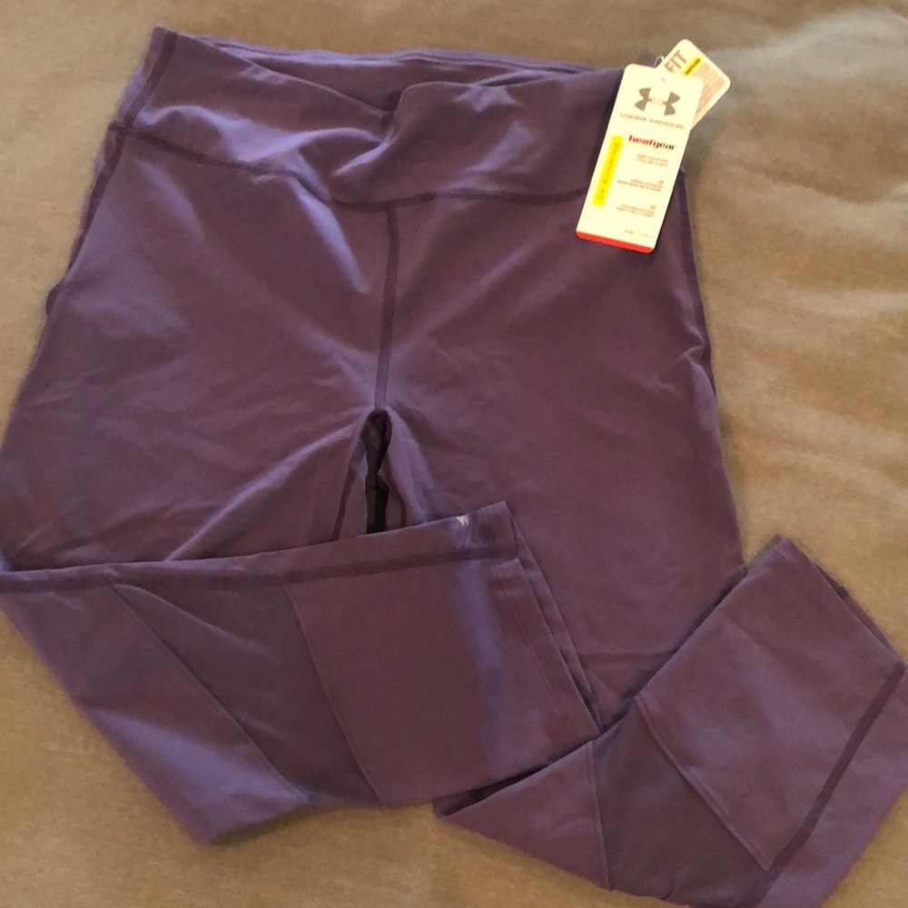 UA heat gear. Women’s purple pants.